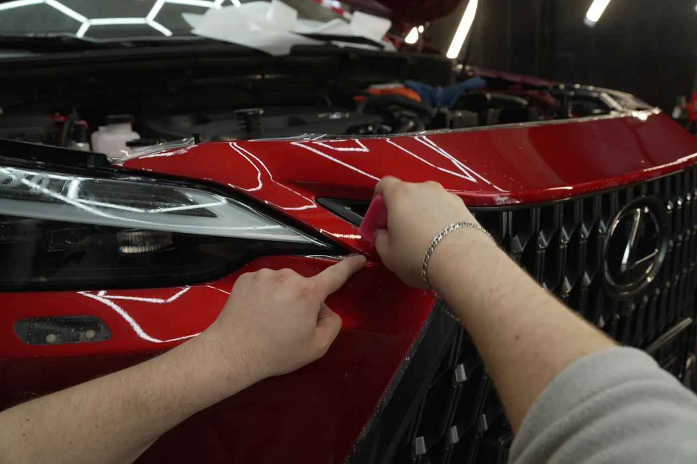 Trimming PPF film at the bonnet edge — Lexus NX, Kraken Detailing Kraków