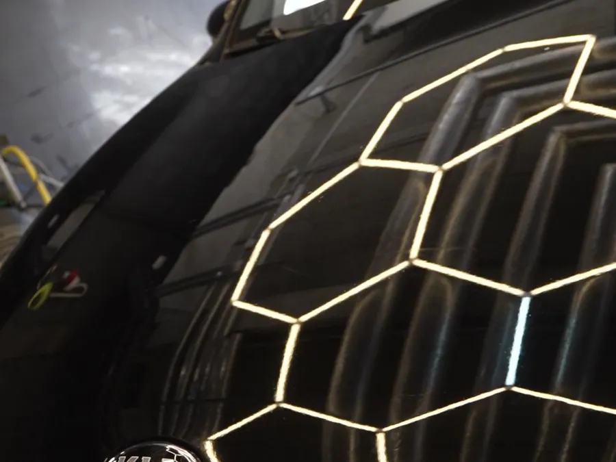 Paint work on a car at the Kraken Detailing studio